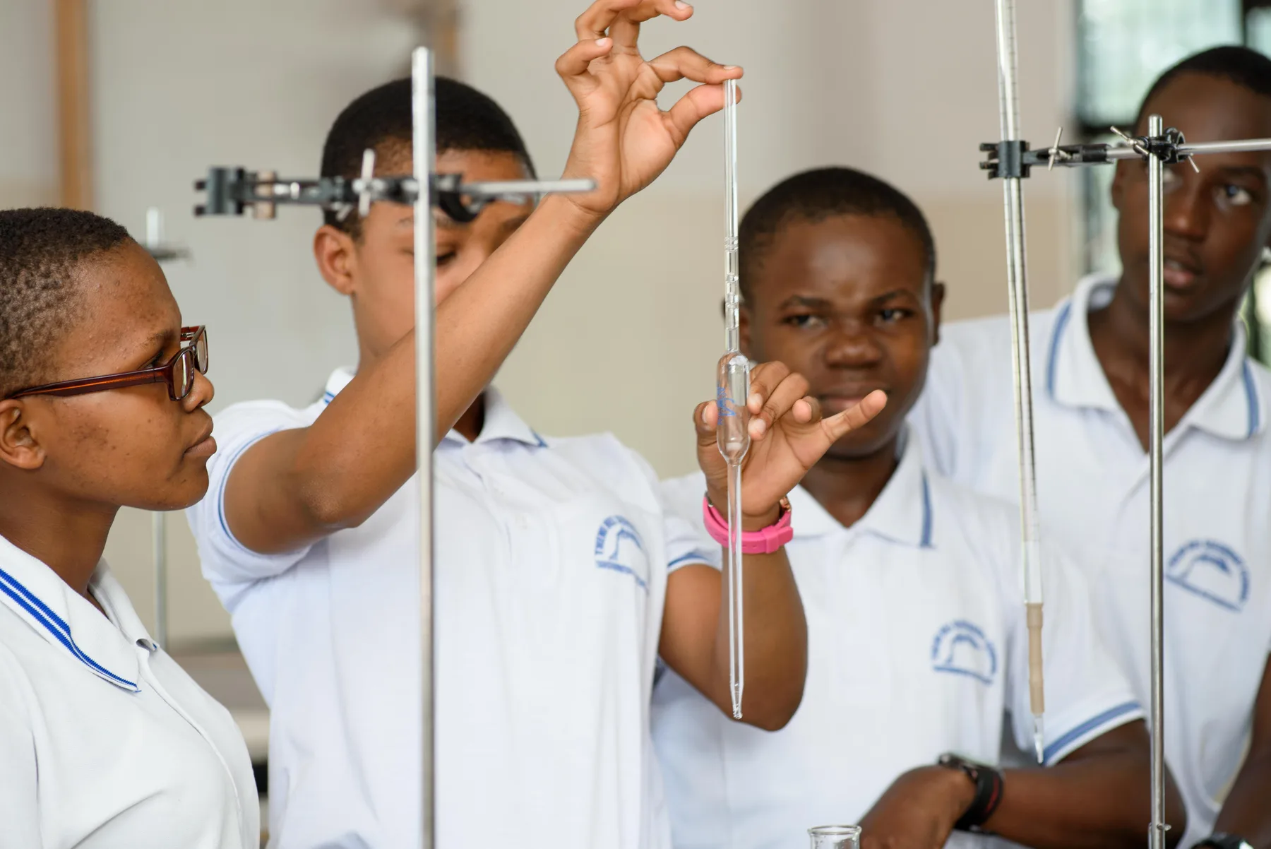 Themi Hill Secondary School students conducting a science lesson